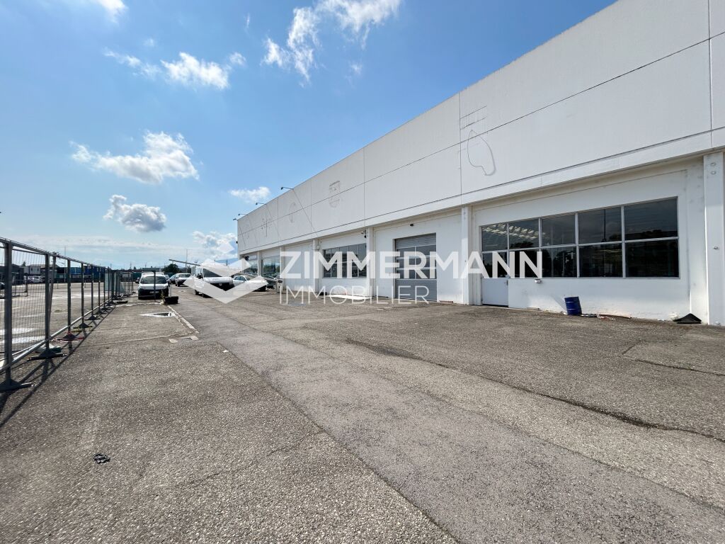 Grande surface industrielle à louer à Meyrin – Idéale pour une entreprise de transport ou d’activités industrielles